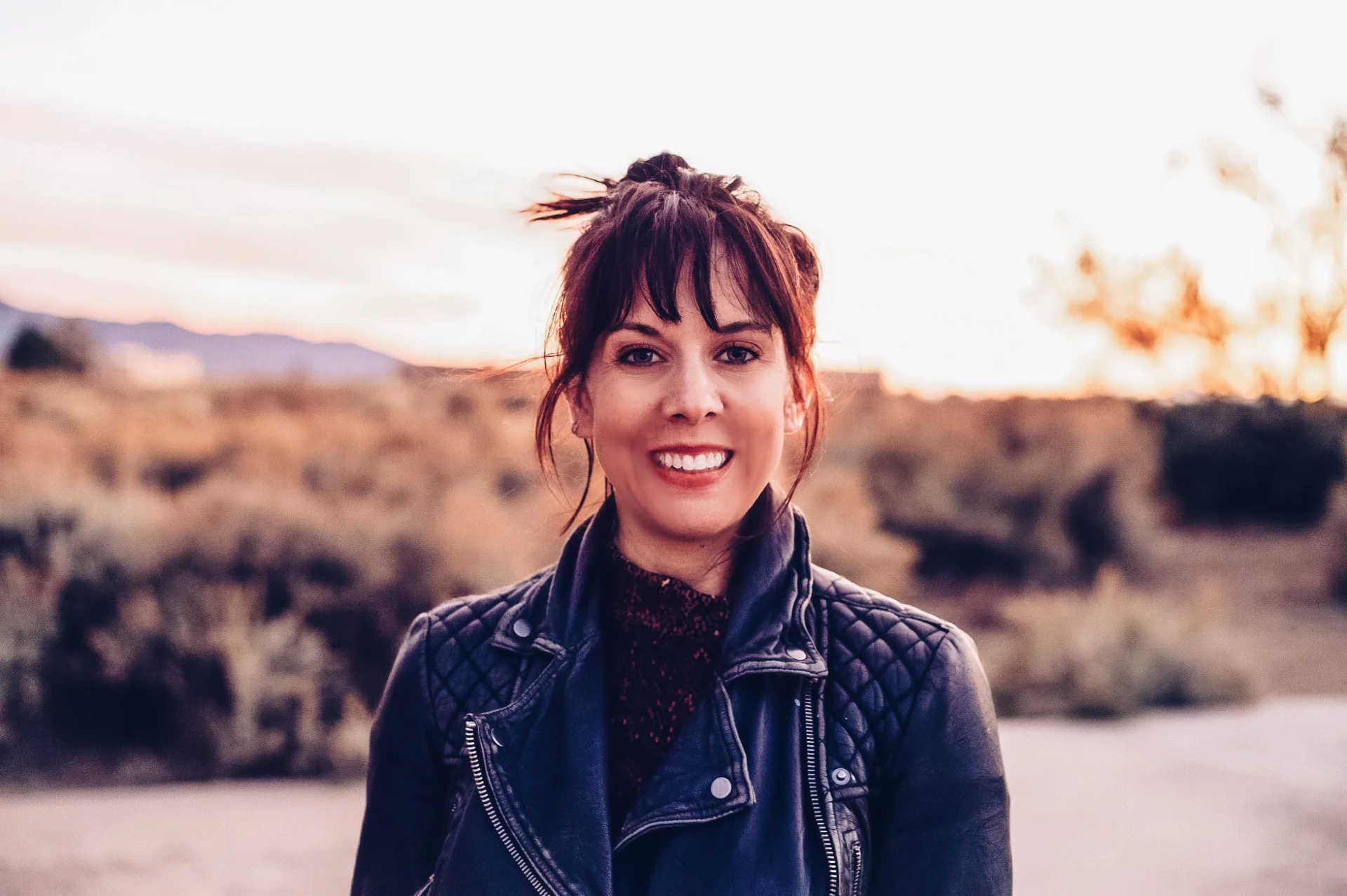 Heidi Trow, partner and owner at Webconsuls, outdoors at sunset